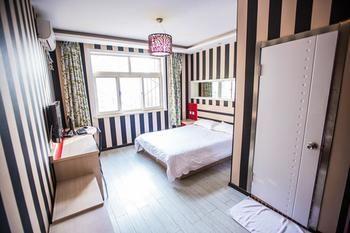 Qingdao Aisen Apartment Hotel Exterior photo